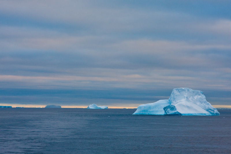 Icebergs At Sunset